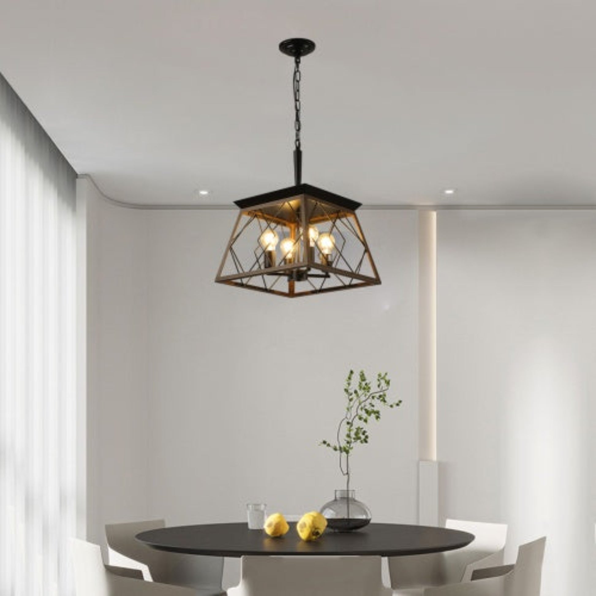 Modern dining room with a pendant light fixture above a round table.