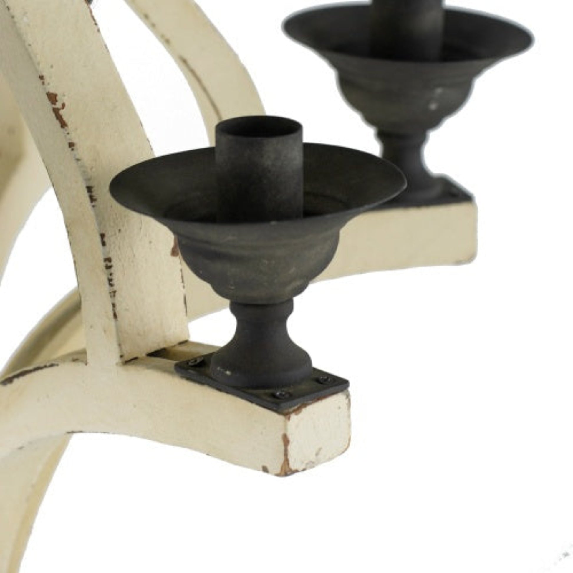 Decorative candle holder with black candle holders on a white background