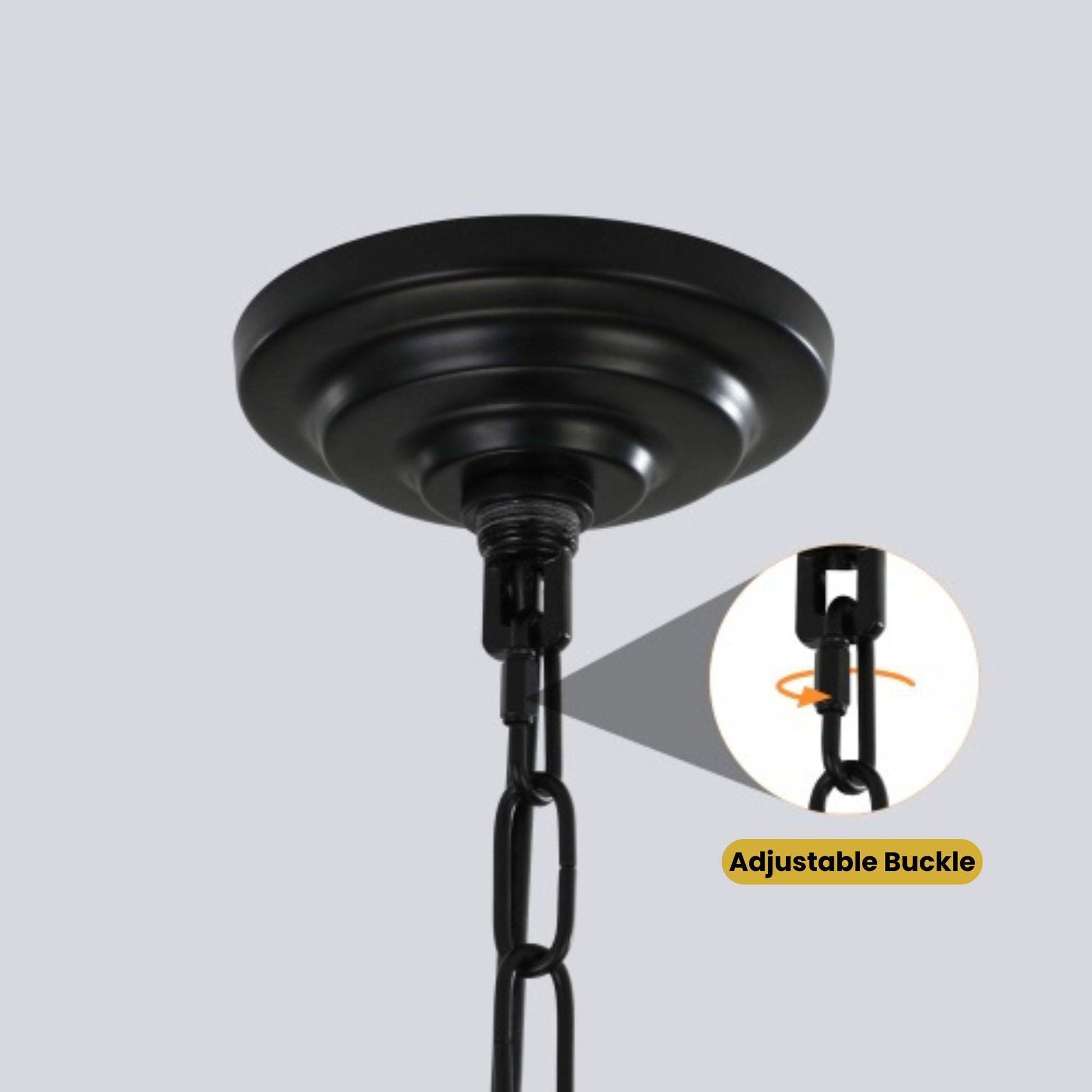 Black ceiling light fixture with adjustable buckle on a gray background