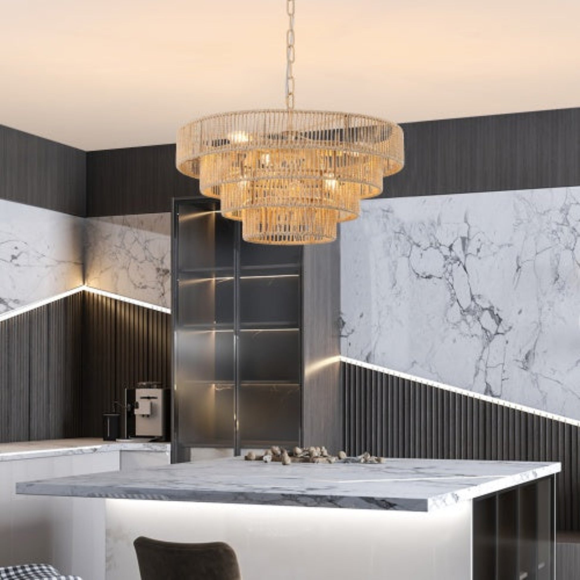 Modern kitchen with marble countertops and a chandelier