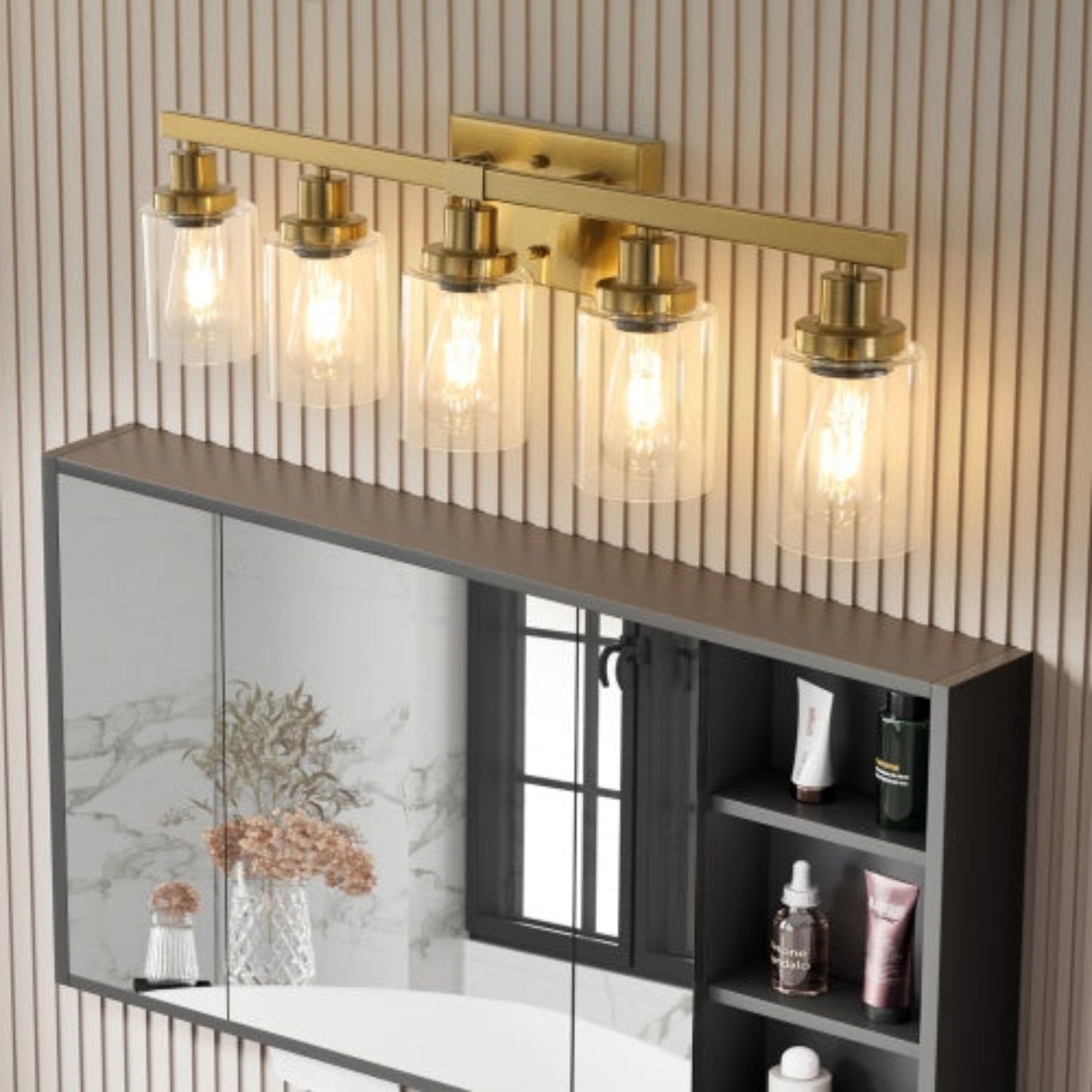 Modern wall-mounted light fixture with glass shades above a shelf.