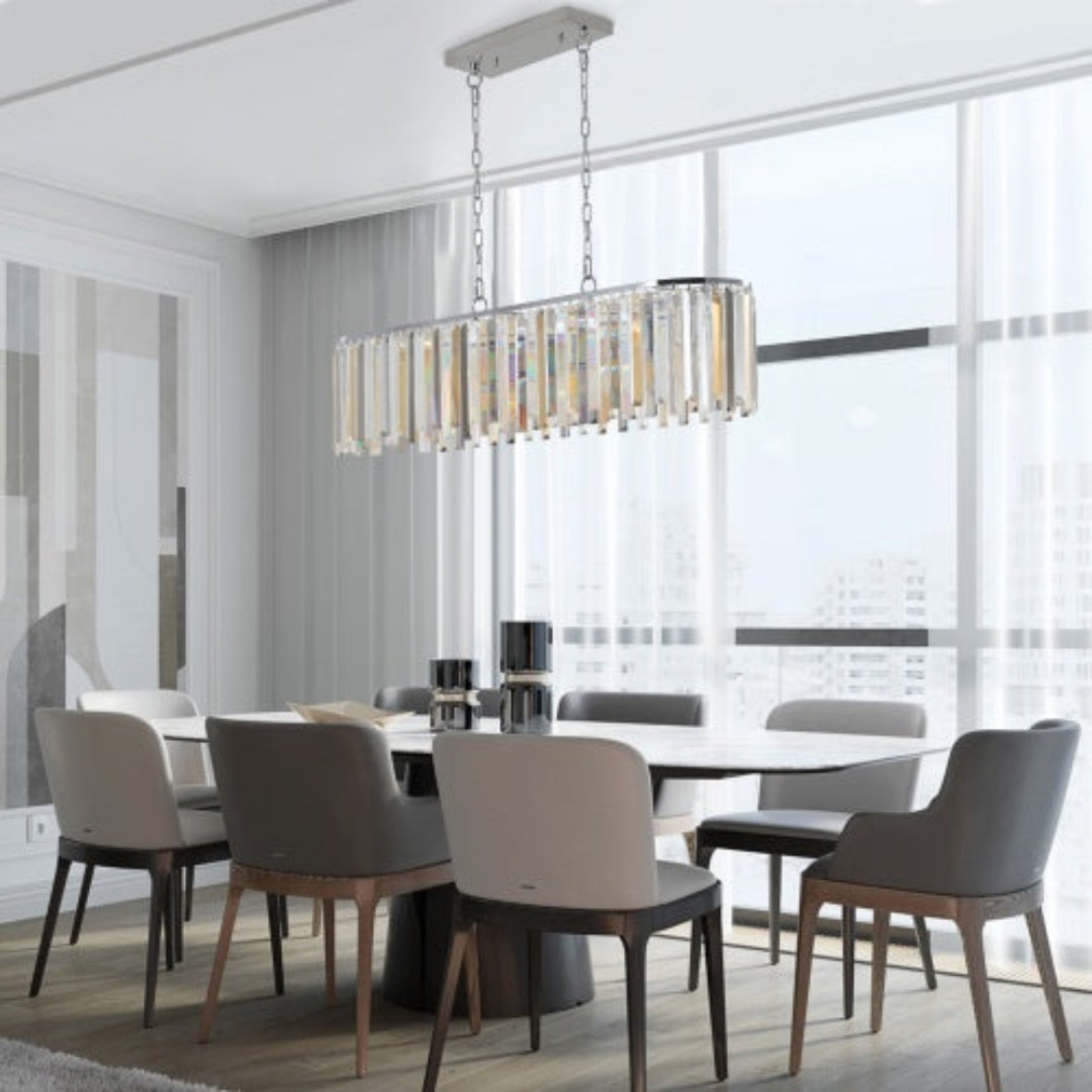 Modern dining room with a chandelier, table, and chairs.