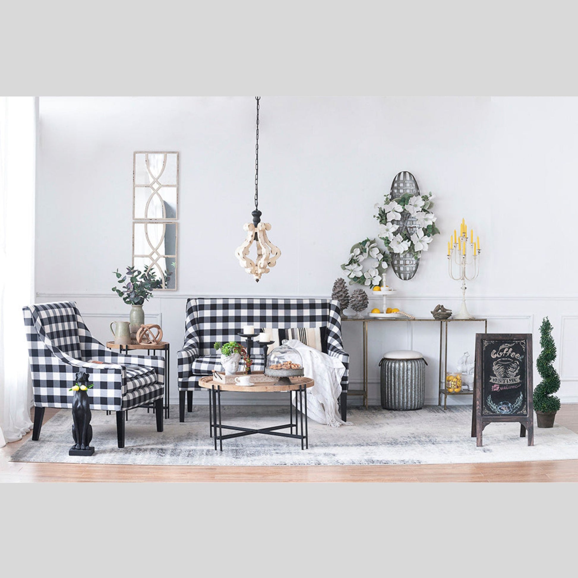Living room with checkered chairs, sofa, and decorative items.